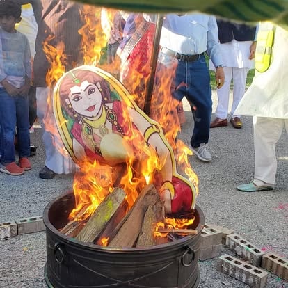 Devotees celebrating Holi with colors at ISKCON Cedar Park