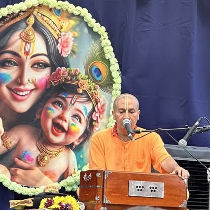 Devotee performing devotional music at ISKCON Cedar Park