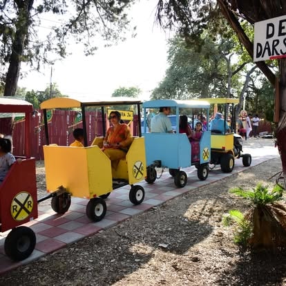 Colorful toy train ride at ISKCON Cedar Park community event