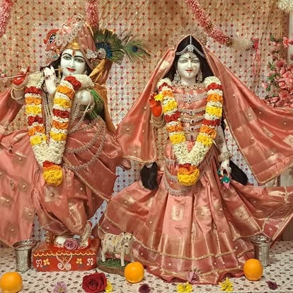 Hindu deity statues adorned with flower garlands at ISKCON Cedar Park