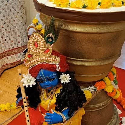 Krishna idol with floral decorations at ISKCON Cedar Park