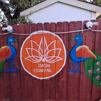 ISKCON Cedar Park mural with peacocks and lotus flowers
