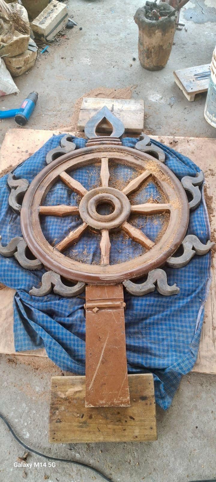 Golden Sudarshana Chakra at the temple apex
